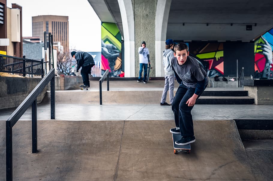 Four Person Skateboarding Outdoor, building, daylight, men, motion HD wallpaper