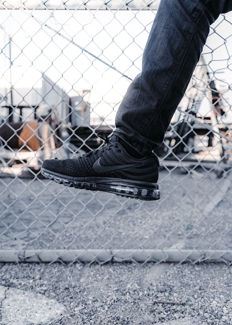 person wearing black Nike running shoe, clothing, apparel, footwear, HD wallpaper