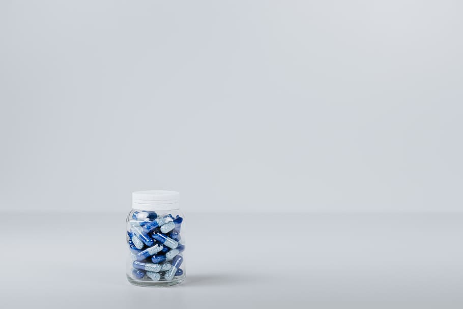 blue and white tablet in container, studio shot, copy space, indoors HD wallpaper