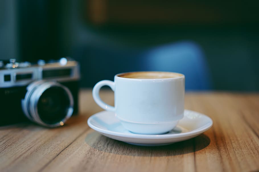 Mug Beside the Land Camera on Table, blur, caffeine, classic HD wallpaper