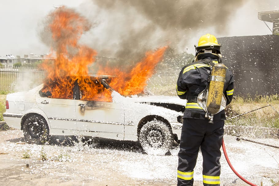 firefighter fighting burning car, person, human, fireman, clothing