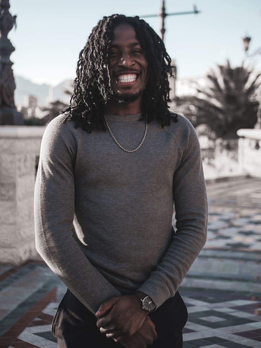 Photo of Smiling Man in Gray Long-sleeved Sweater, dreadlocks HD wallpaper