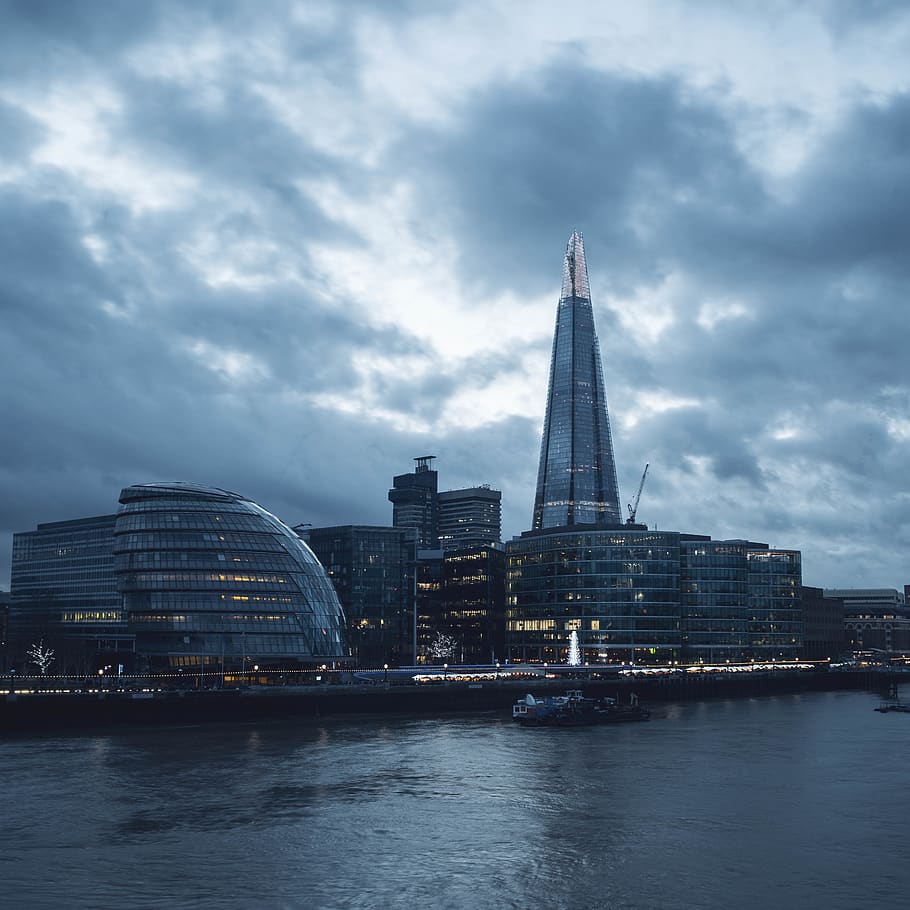 cityscape under gray clouds, building, architecture, office building HD wallpaper