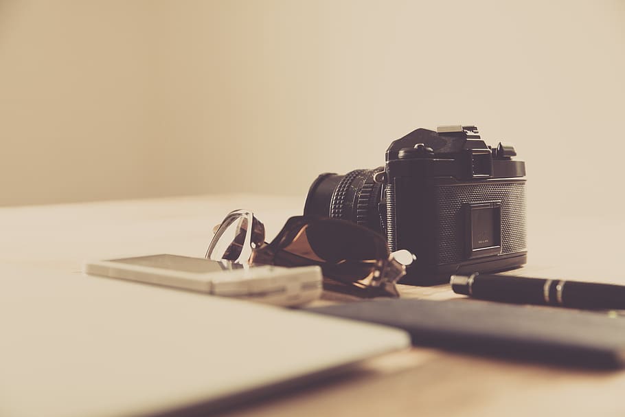 black DSLR camera, still life, indoors, table, close-up, no people HD wallpaper