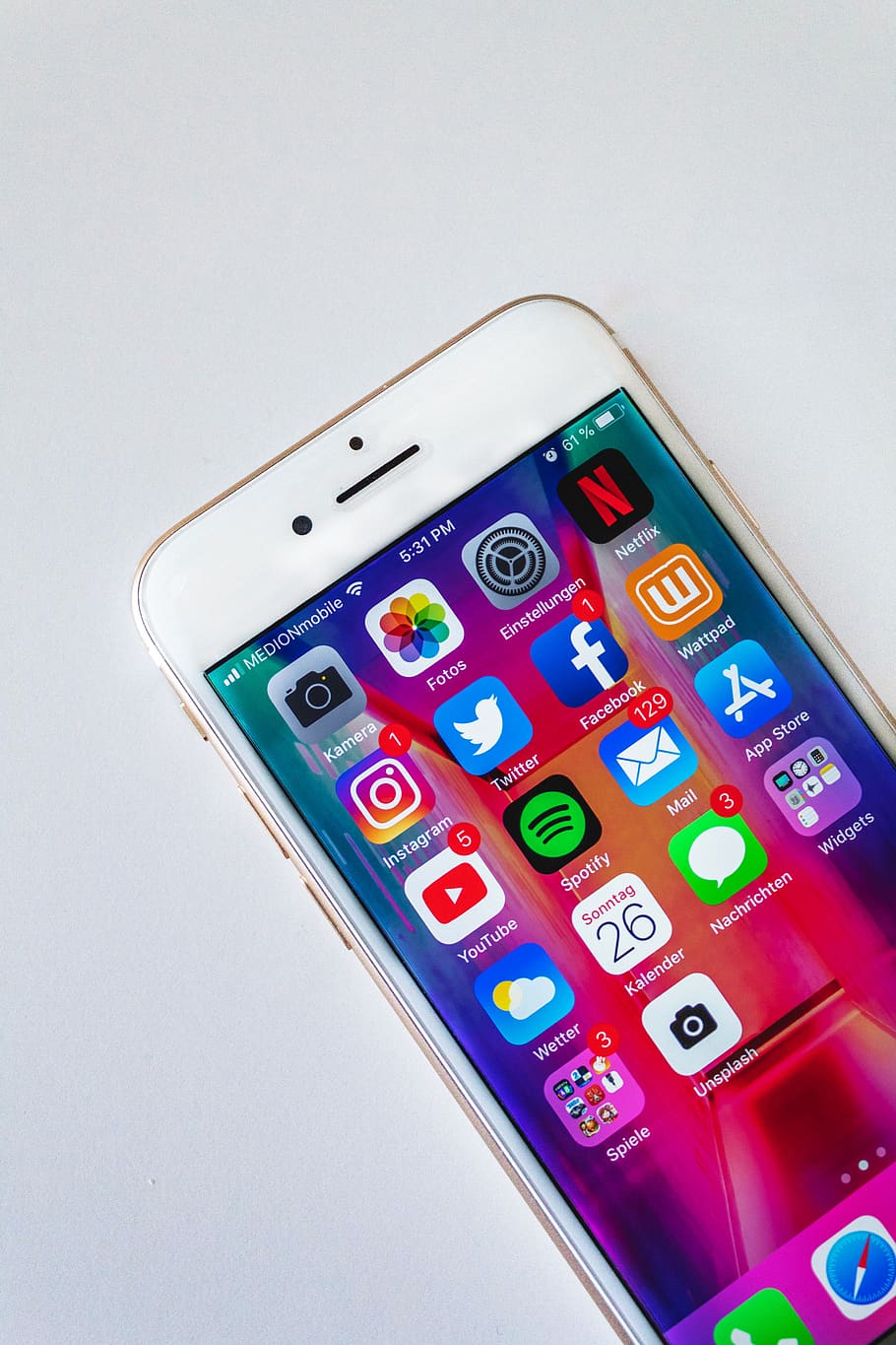 turned on gold iphone 6, indoors, studio shot, white background HD wallpaper
