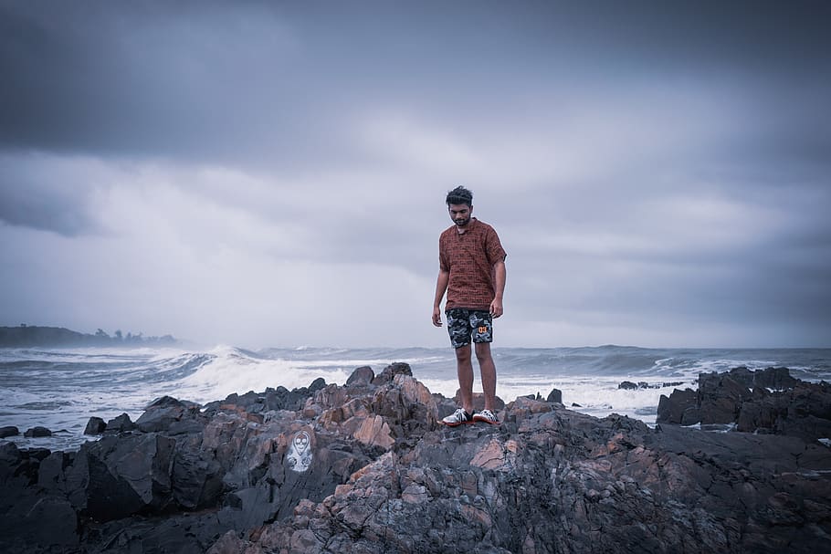 man standing on shore, apparel, clothing, shorts, person, human HD wallpaper
