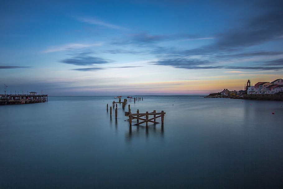 Sea Dock Near Buildings, bay, boat, dawn, landscape, nature, ocean HD wallpaper