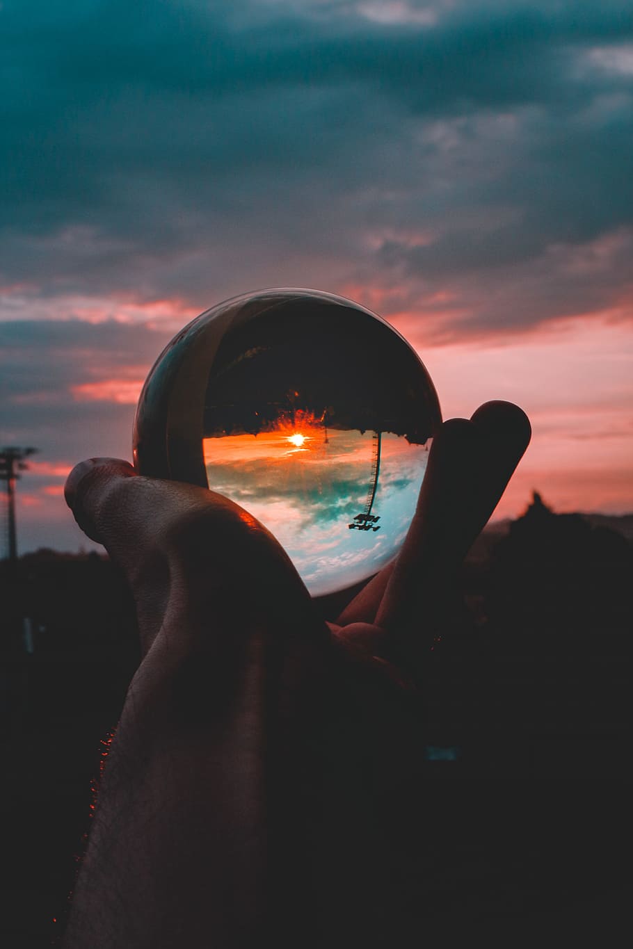 Round Clear Glass Orb, clouds, dusk, evening, fingers, hand, holding HD wallpaper