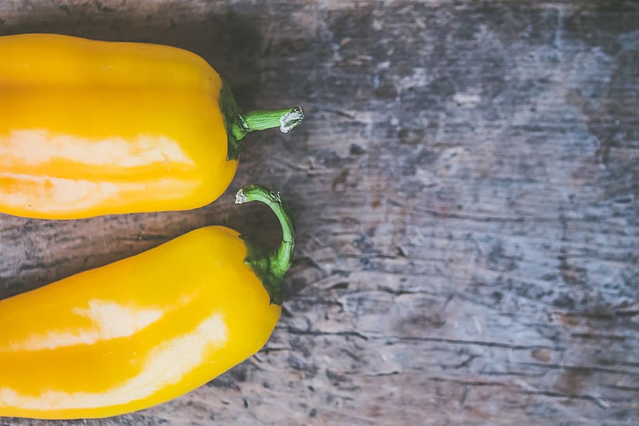 Two Yellow Chili Peppers, background, chilli peppers, close-up HD wallpaper