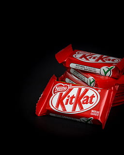 stack of Kitkat snacks, black background, studio shot, indoors HD wallpaper