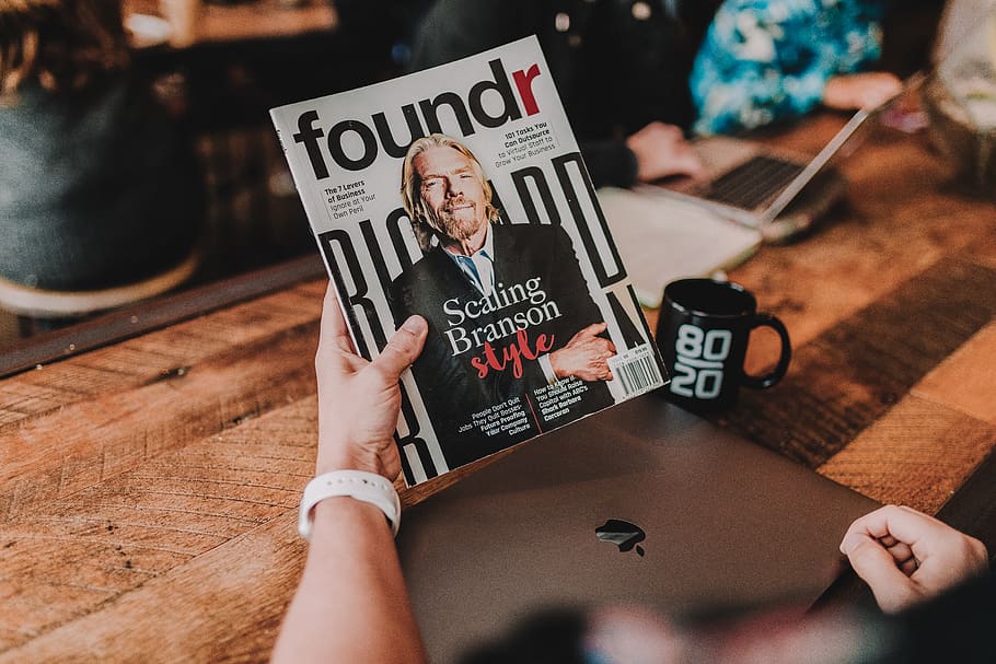 person holding Foundr book, communication, table, text, lifestyles HD wallpaper