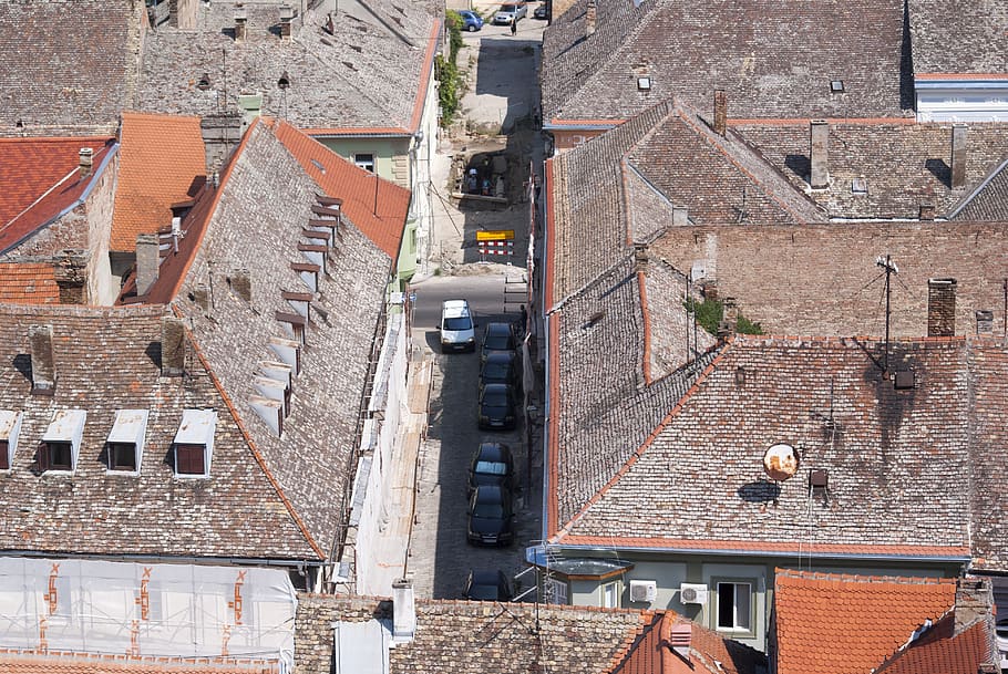 vehicles on road during daytime, brick, urban, building, city HD wallpaper