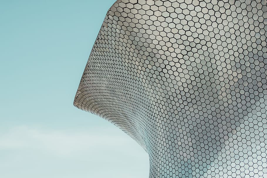 closeup photo of curved building, minimalist, architecture, gray