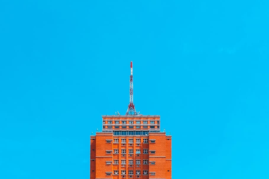 orange concrete building, urban, city, high rise, town, apartment building