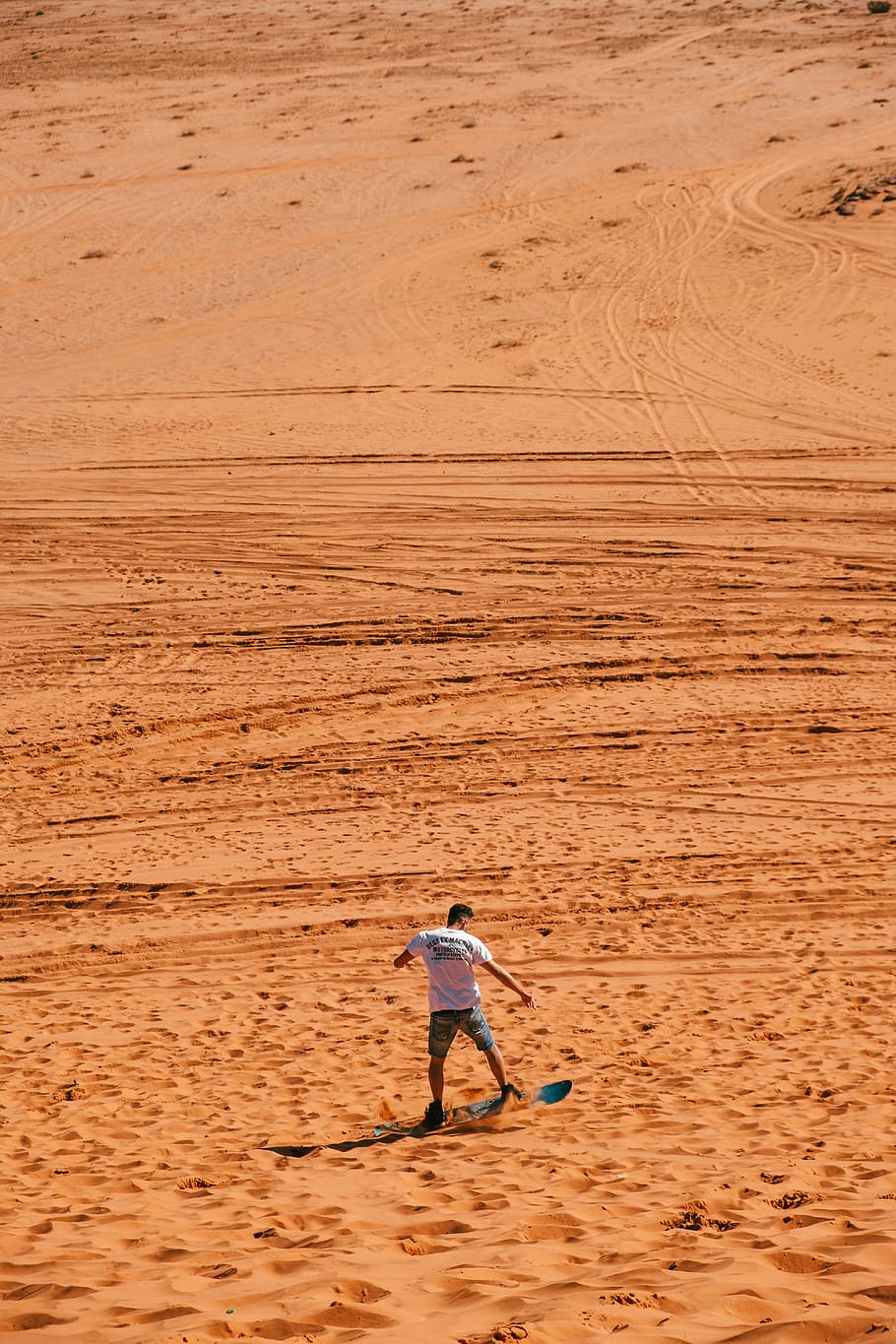 man standing on land, human, person, wadi rum, jordan, soil, shorts HD wallpaper