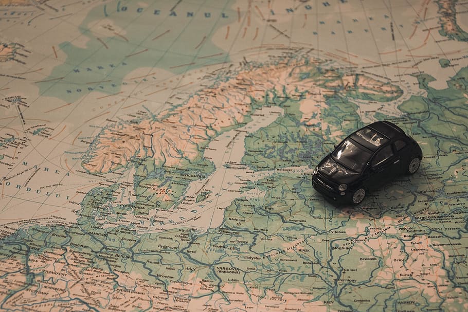 Black Toy Car on World Map Paper, adventure, Baltic Sea, denmark