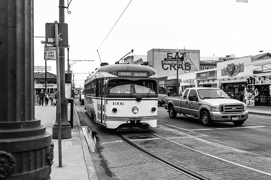 Ford F-150 and city tram on road during daytime greyscale photography, HD wallpaper