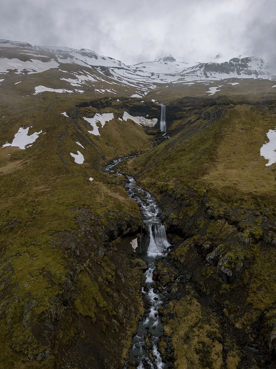 waterfall and river between hills, beauty in nature, snow, mountain HD wallpaper