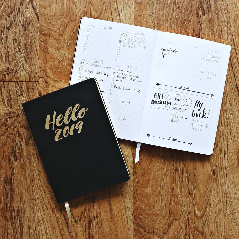 Black Hello 2019 Notebook on Brown Wooden Surface, desk, diary HD wallpaper