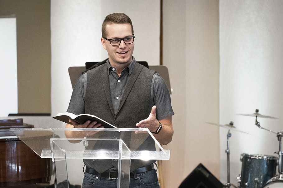 bible, preaching, pastor, front view, one person, indoors, glasses