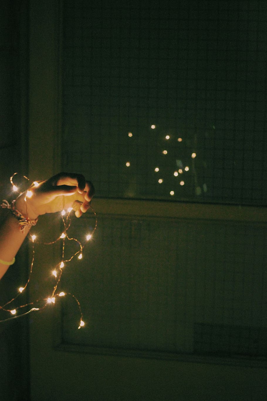 person holding white string lights, lighting, flare, human, night life HD wallpaper