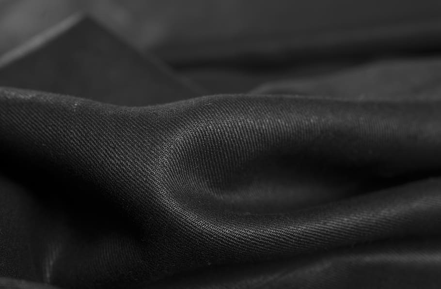 black cloth, apparel, pants, clothing, skin, finger, jeans, denim