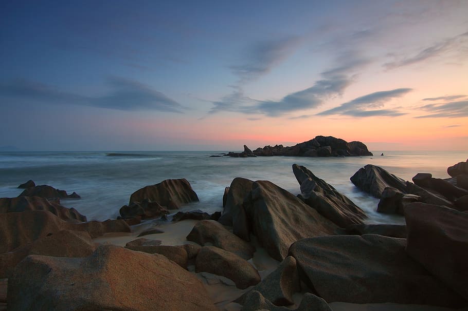 Rocks on Beach at Sunset, dawn, nature, ocean, scenic, sea, seascape HD wallpaper