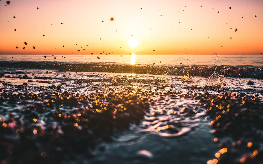 rocks being thrown on the water during sunset, winter, summer HD wallpaper