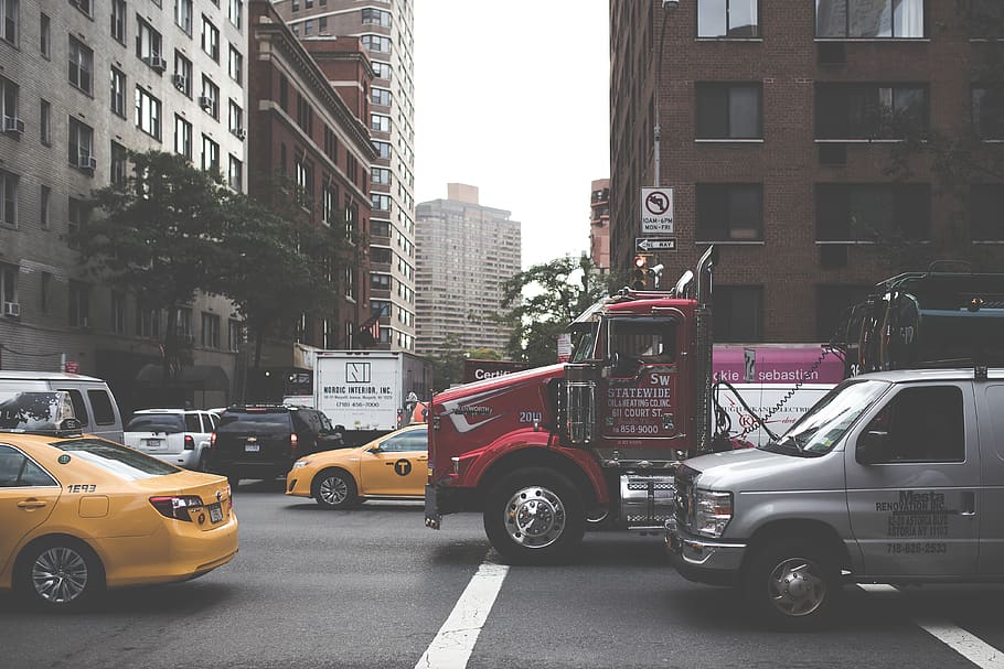 Traffic at an intersection., city, mode of transportation, building exterior HD wallpaper