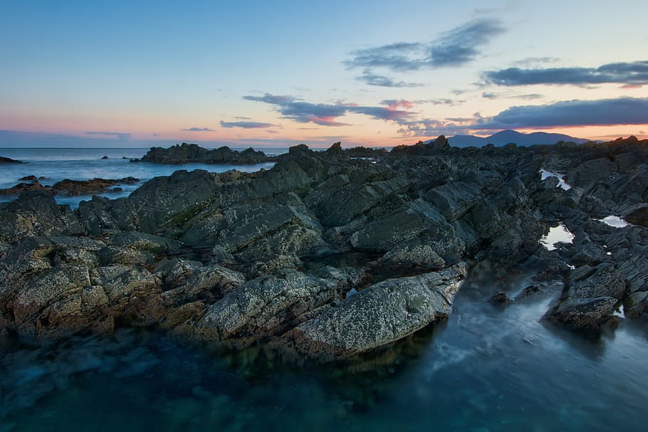 Photo of Rock Formation On Ocean, 4k wallpaper, beach, clouds