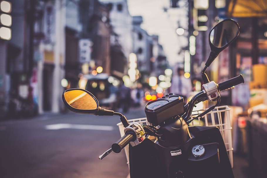 selective focus photograph of motorcycle handlebar, japan, kyoto