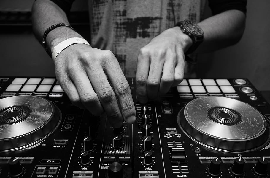 Grayscale Photography of Person Using Dj Controller, Analogue