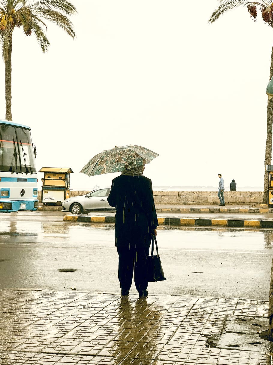 egypt, alexandria, rain, raining, umbrella, street, sky, woman, HD wallpaper
