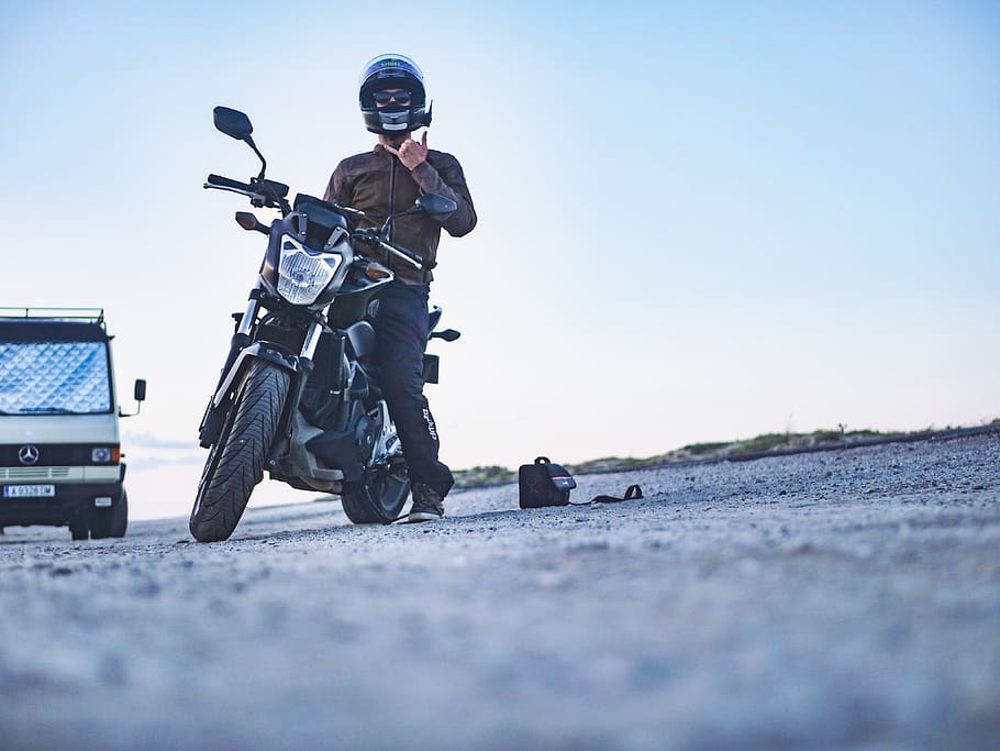 man riding motorcycle during daytime, transportation, road, sky HD wallpaper