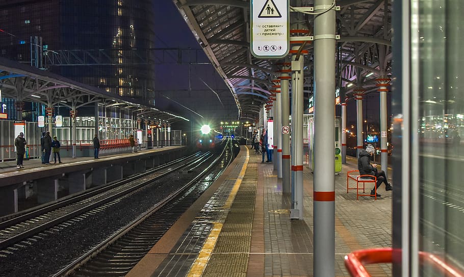 pillars, rails, train, evening, railway, rail transportation HD wallpaper