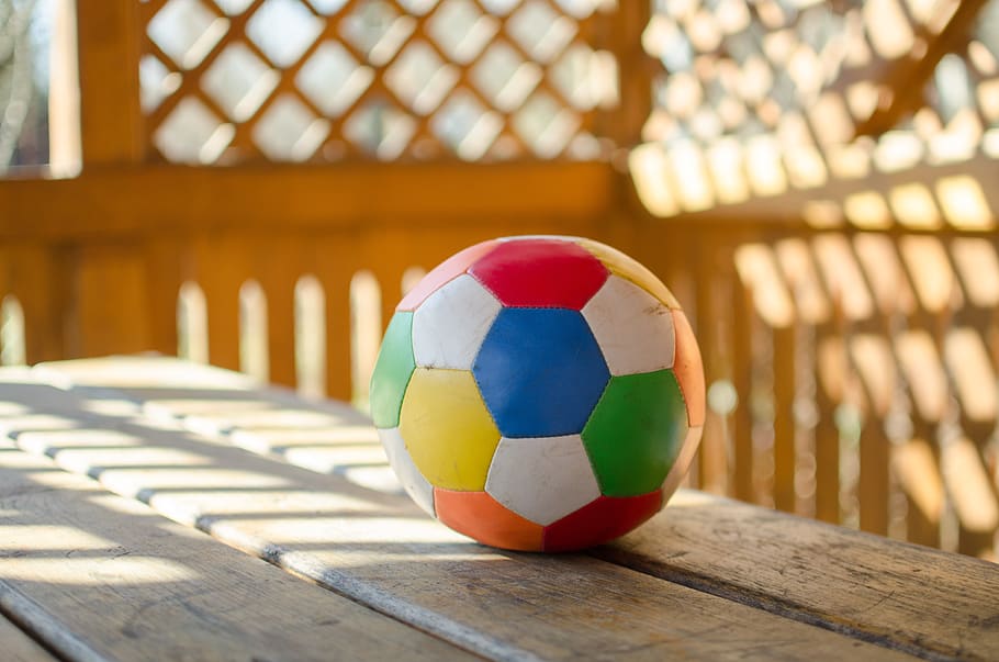 ball, football, focus on foreground, sports equipment, wood - material