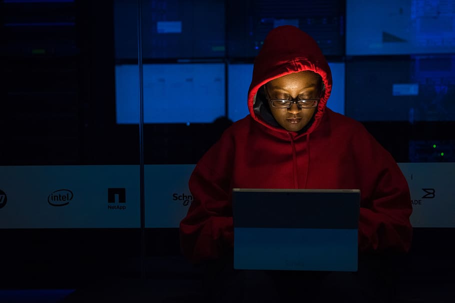Woman in Red Hoodie Using Gray Laptop Computer, adult, dark, education