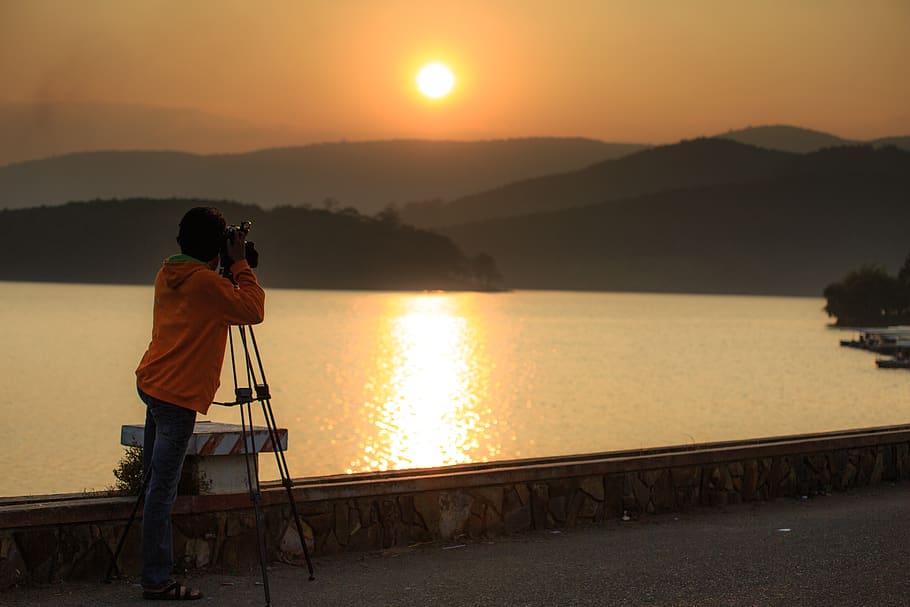 Man About to Shoot a Photo on Black Mountain, backlit, beach HD wallpaper