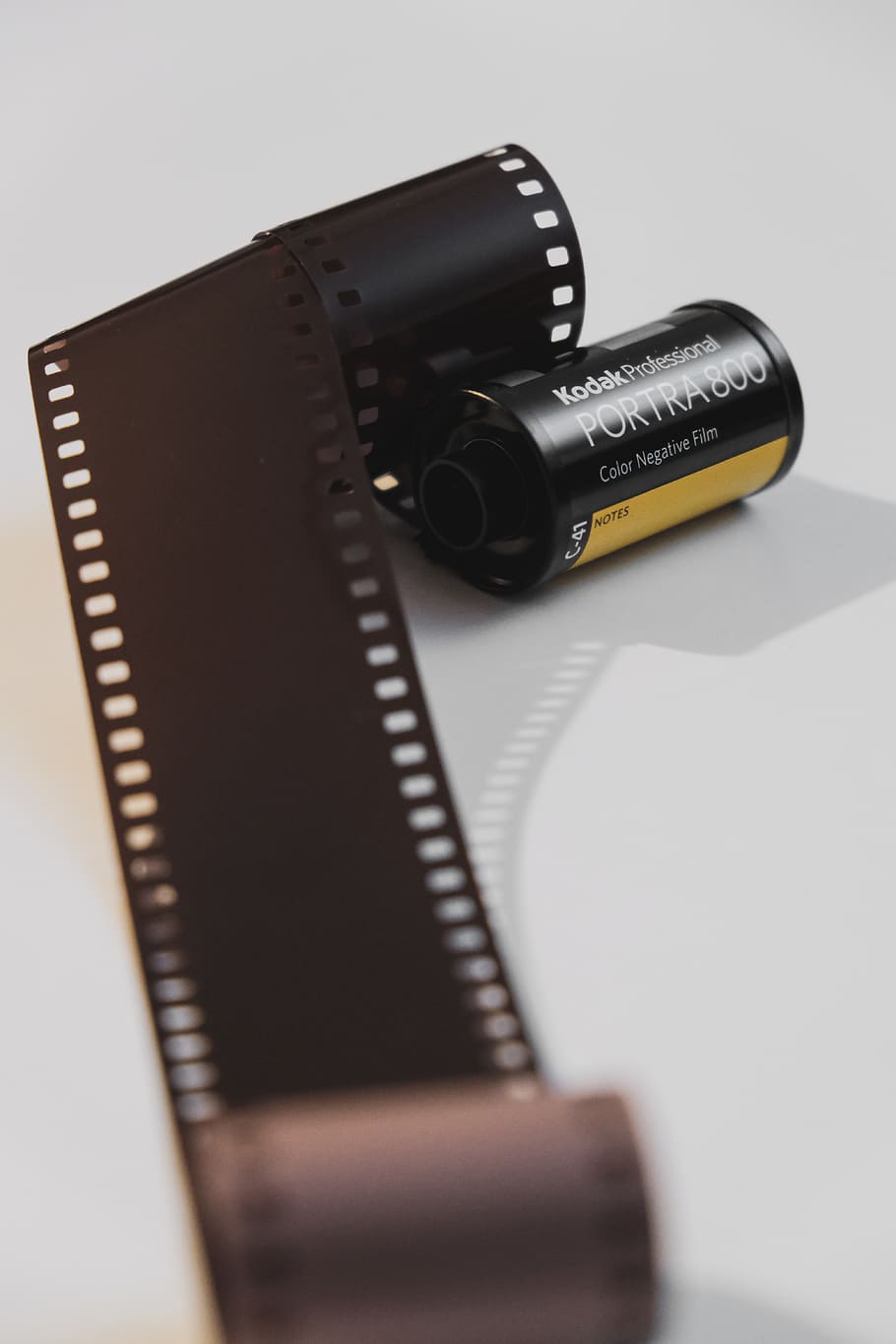 brown film, studio shot, indoors, white background, close-up HD wallpaper