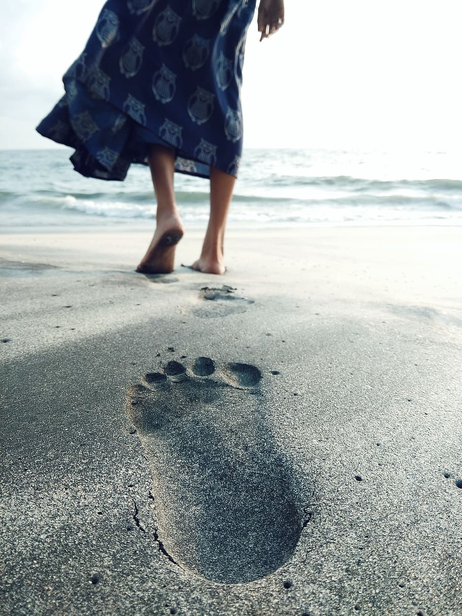 Photo of Woman Walking Barefoot on Seashore, beach, blur, close-up