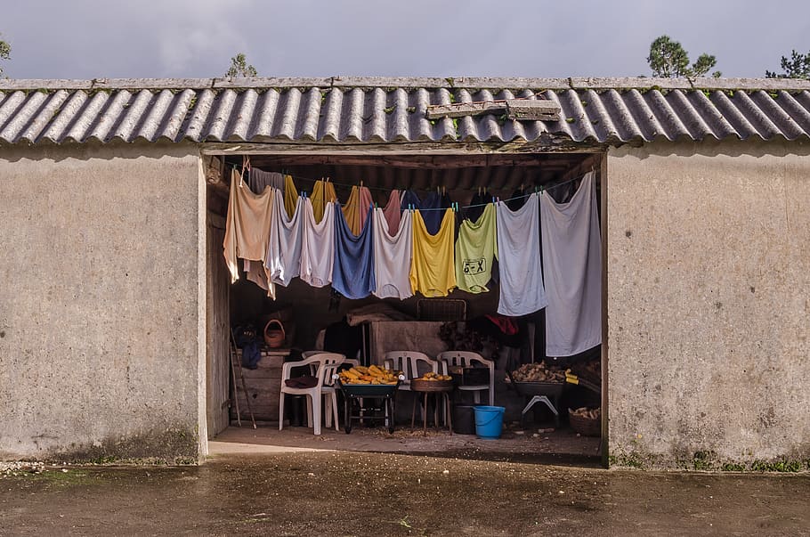 assorted-colored textiles, drying, hanging, architecture, laundry HD wallpaper