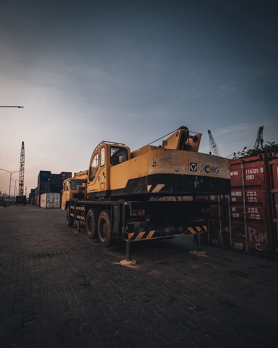 Orange Heavy Equipment, architecture, cargo, cloudy sky, construction HD wallpaper
