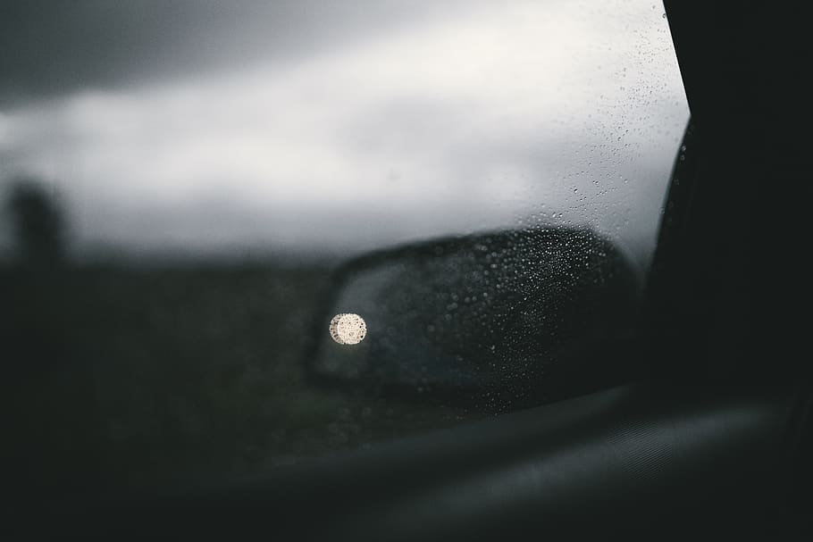 automotive wing mirror, window, water, storm, rain, light, bokeh