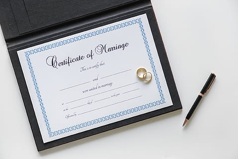 Certificate of Marriage and Two Gold-colored Rings, close-up HD wallpaper