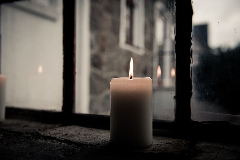 Pillar Candle Near Clear Glass Window, burning, candlelight, flame HD wallpaper