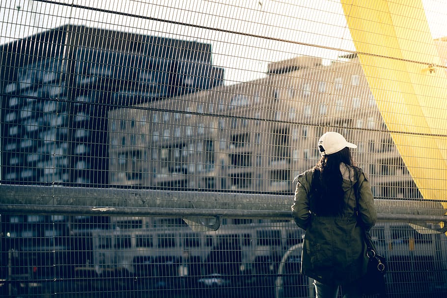 person, daytime, gate, light, faceless, hat, woman, girl, urban HD wallpaper