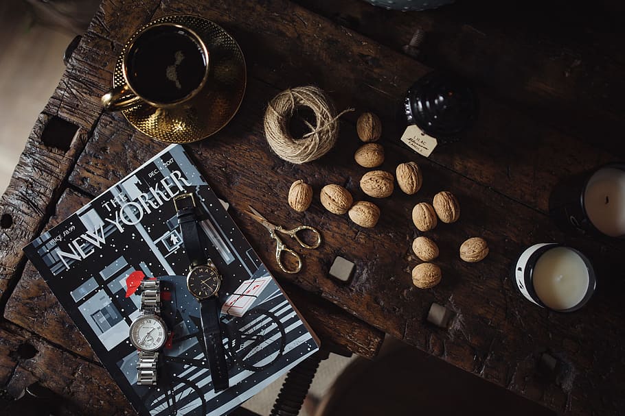 New Yorker, some nuts, watches, and other things on the old, wooden table, HD wallpaper