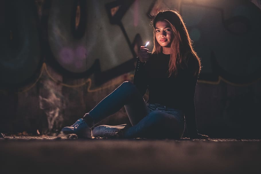 Photo of a Woman Holding a Lighter, adult, blur, dark, evening, HD wallpaper