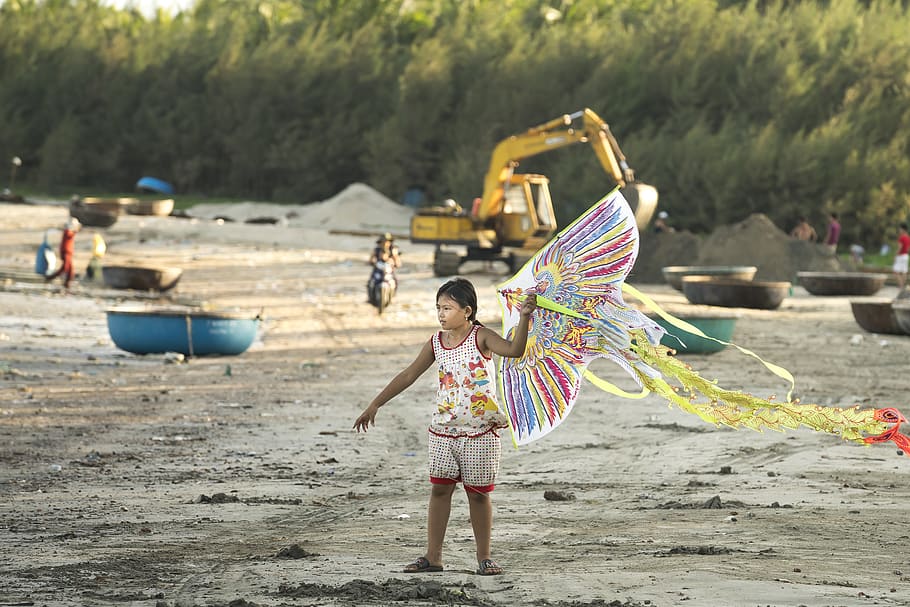 Girl Holding Kite , child, fun, kid, person, playing, sand, childhood HD wallpaper