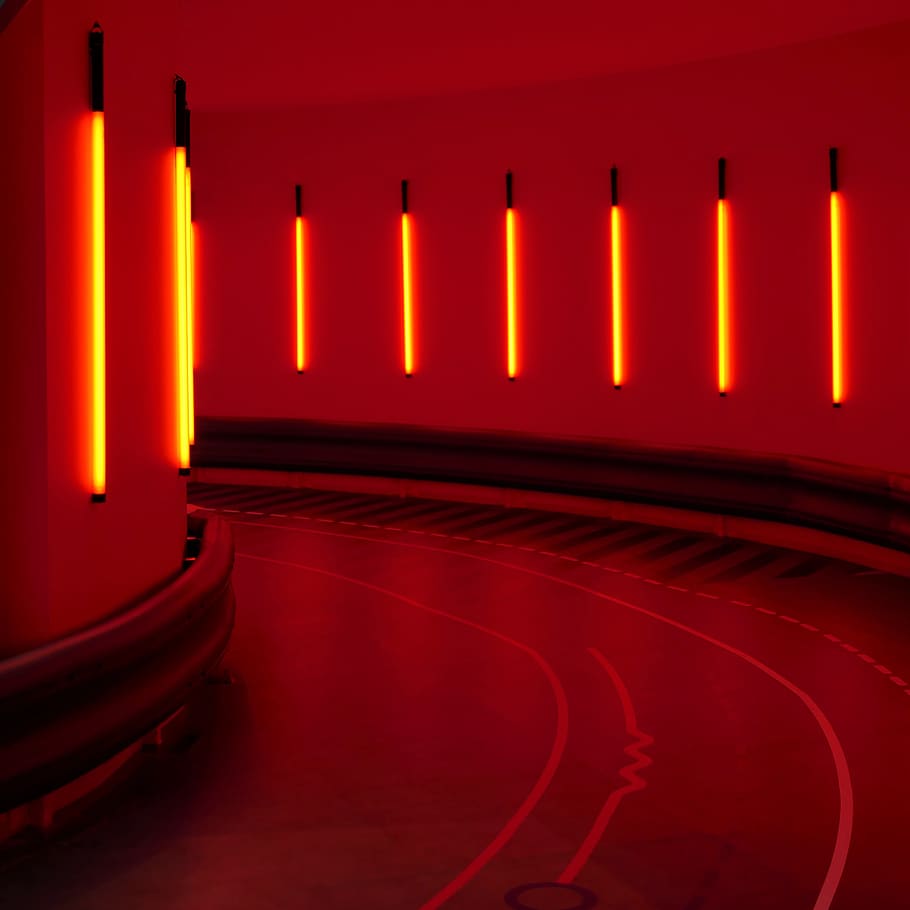 tunnel with dim light, illuminated, neon, red, no people, orange color